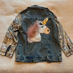Girls unicorn Jean jacket with silver sparkly sequin sleeves. Size 130 cm